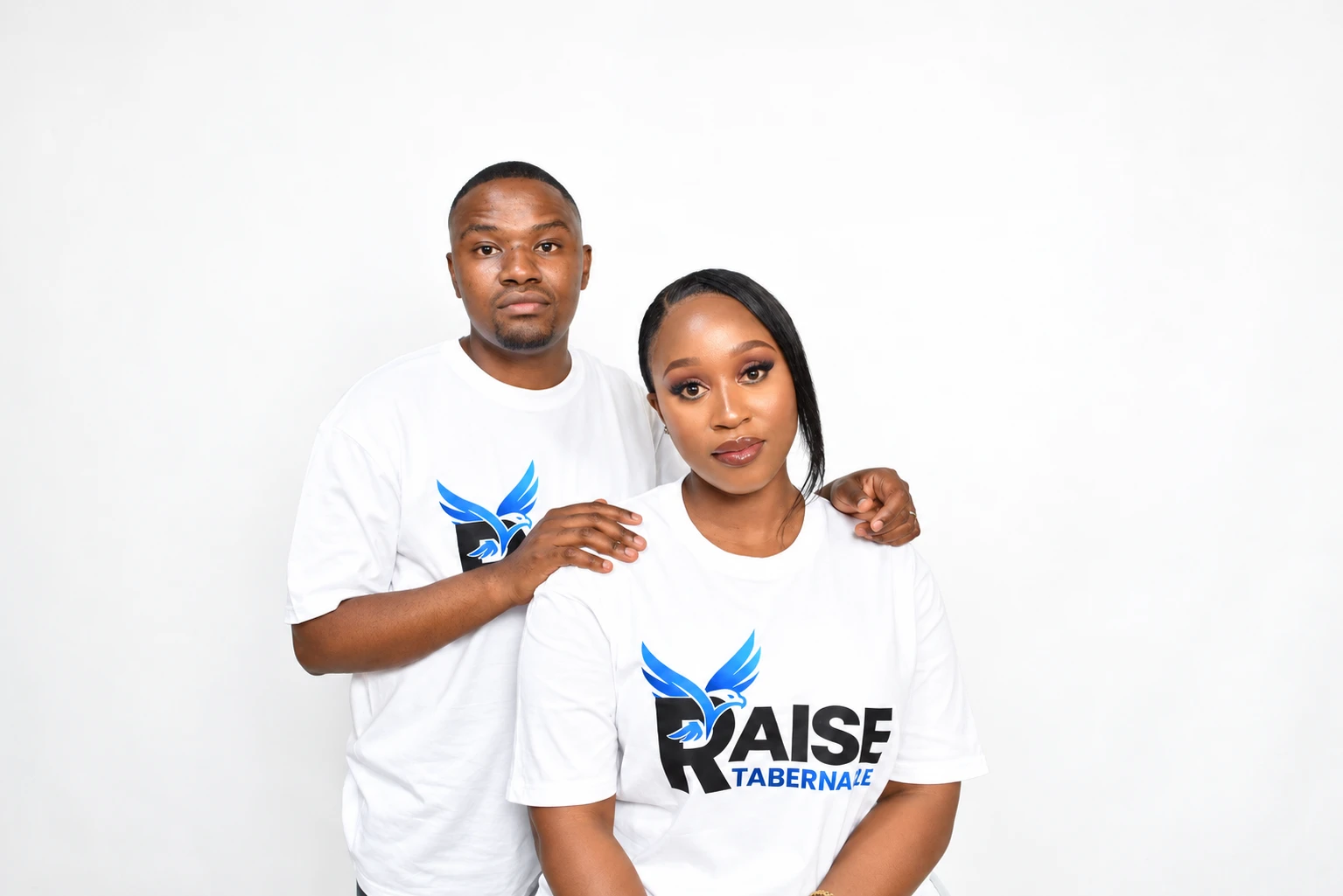Ishmael and Princess Mbongwana in Raise Tabernacle T-shirts
